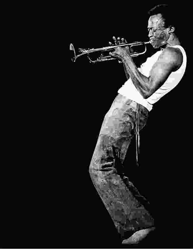 A Black And White Photograph Of Miles Davis Playing The Trumpet. Down Beat Hall Of Fame The Miles Davis Reader: Downbeat Hall Of Fame