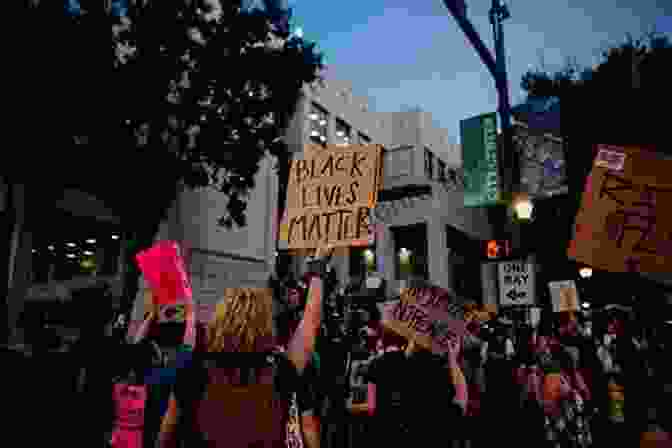 A Peaceful Protest With People Holding Signs Advocating For Nonviolence Discovering Nonviolence (Nonviolence: Origins And Outcomes 1)