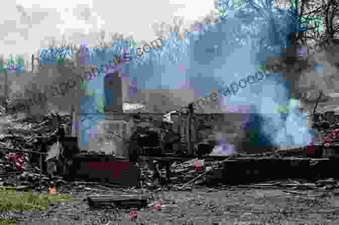 A Photo Of A House Being Burned Down By Soldiers They Took Our Village