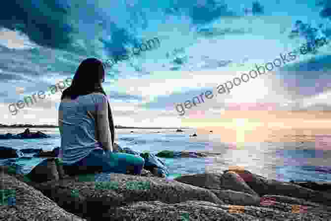 A Photo Of A Woman Sitting On A Beach, Looking Out At The Ocean. Where To Next?