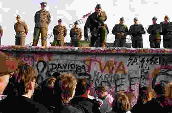 A Photograph Of The Berlin Wall Being Torn Down, A Symbolic Moment In The Collapse Of The Soviet Union. NATO S Enlargement And Russia: A Strategic Challenge In The Past And Future (Soviet And Post Soviet Politics And Society 229)