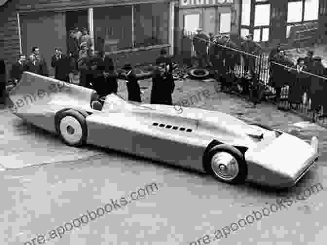 Sir Malcolm Campbell Standing Beside His Record Breaking Car, Bluebird, After Setting The Land Speed Record Moments That Made Racing History (Motorsports History)