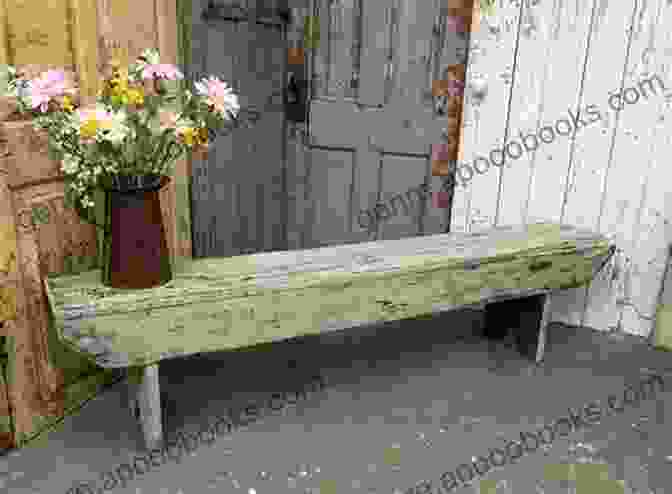 The Old Wooden Bench A Weathered Wooden Bench, Bathed In Golden Sunlight, Invites Contemplation Beneath A Majestic Oak Tree. The Old Wooden Bench